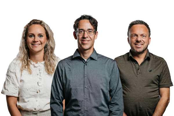 Three colleagues from One Zero IT smiling in the camera